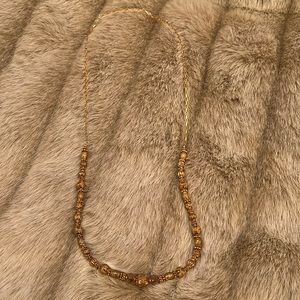 Beautiful costume faux gold beaded necklace.